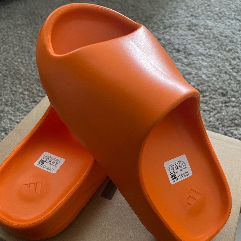 Brand new Yeezy slides in orange